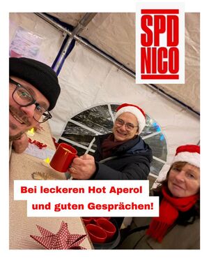 Nico Schurr bekommt Hot Aperol von Heide und Thorsten gereicht